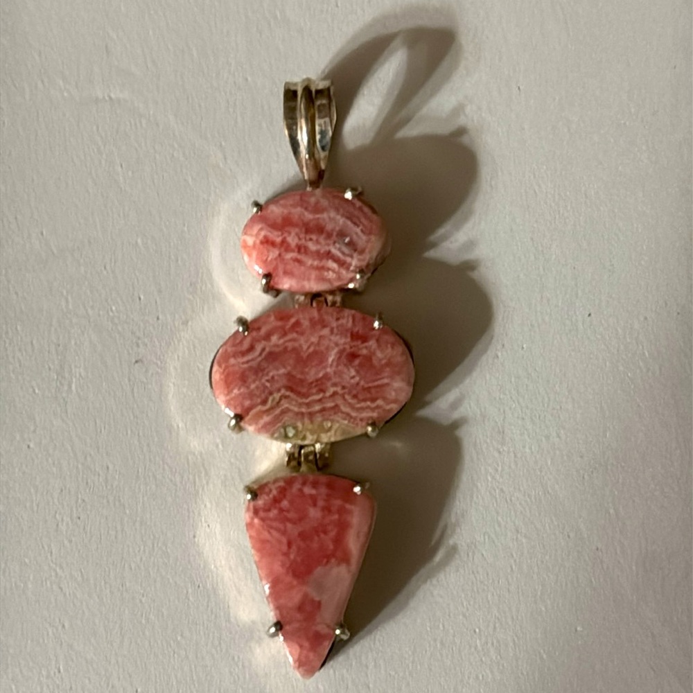 Beautiful hues of manganese pink rhodochrosite pendant
